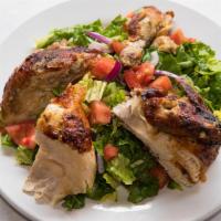 Rotisserie Chicken Salad · Romaine lettuce, tomatoes and onions tossed in our house dressing and topped with boneless r...