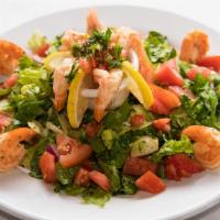 Nart's Shrimp Salad · Romaine lettuce, tomatoes and onions topped with succulent sauteed shrimp; tossed in our hou...