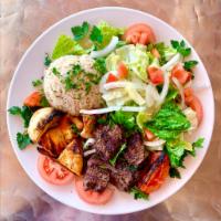 Mixed Kabob Bowl Game Day · 1 Skewer beef kabob and 1 skewer chicken kabob served with rice and house salad.