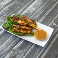 Chicken Sate · 5 skewers. Chicken with peanut sauce and cucumber dip.