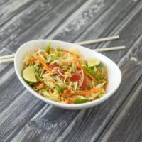 Papaya Salad · Tomatoes, lime juice, garlic, green bean, and peanuts. Spicy.