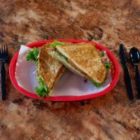 Santa Fe Club Sandwich Combo · Turkey, bacon, avocado, lettuce, tomato, sprouts and chipotle mayo served on toasted multi-g...