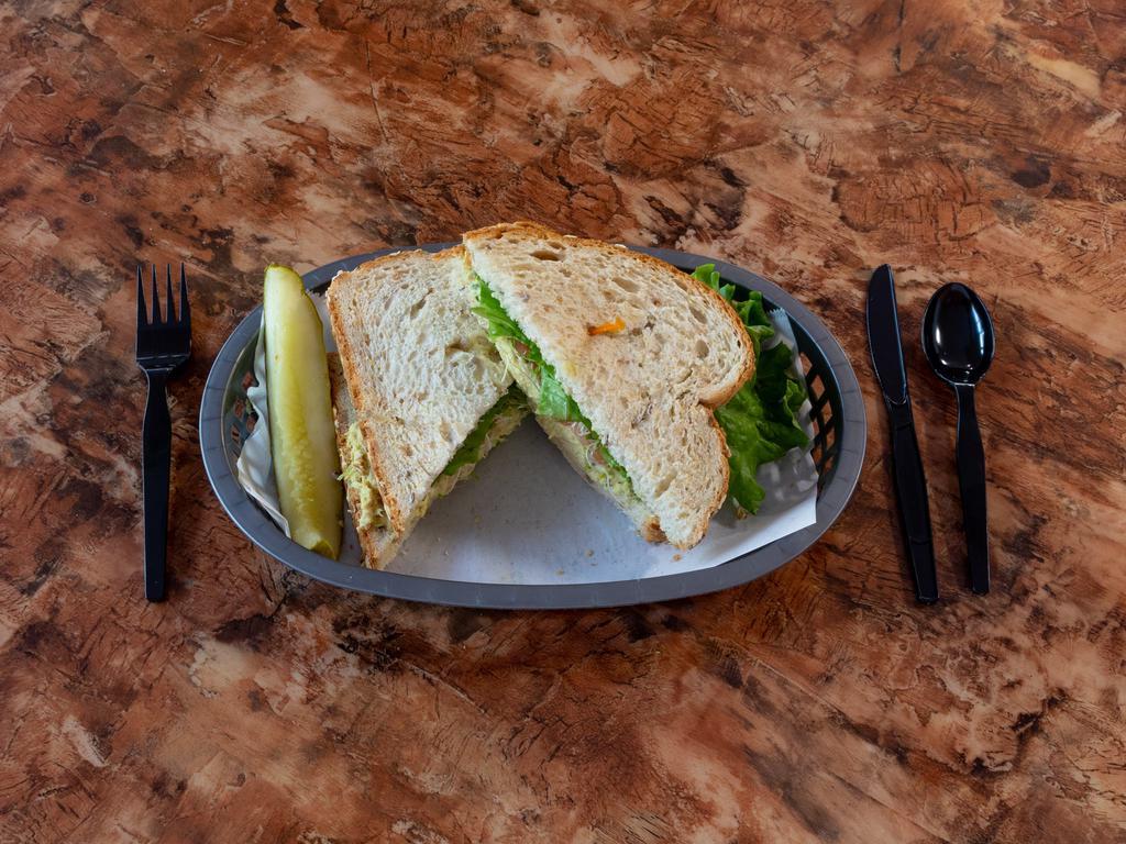 Boston Tuna Sandwich Combo · Tuna salad, lettuce, tomato, sprouts and mayo on a multi-grain with a pickle spear. Includes side of potato salad, macaroni salad, coleslaw, pasta salad or chips and a 20 oz. drink.