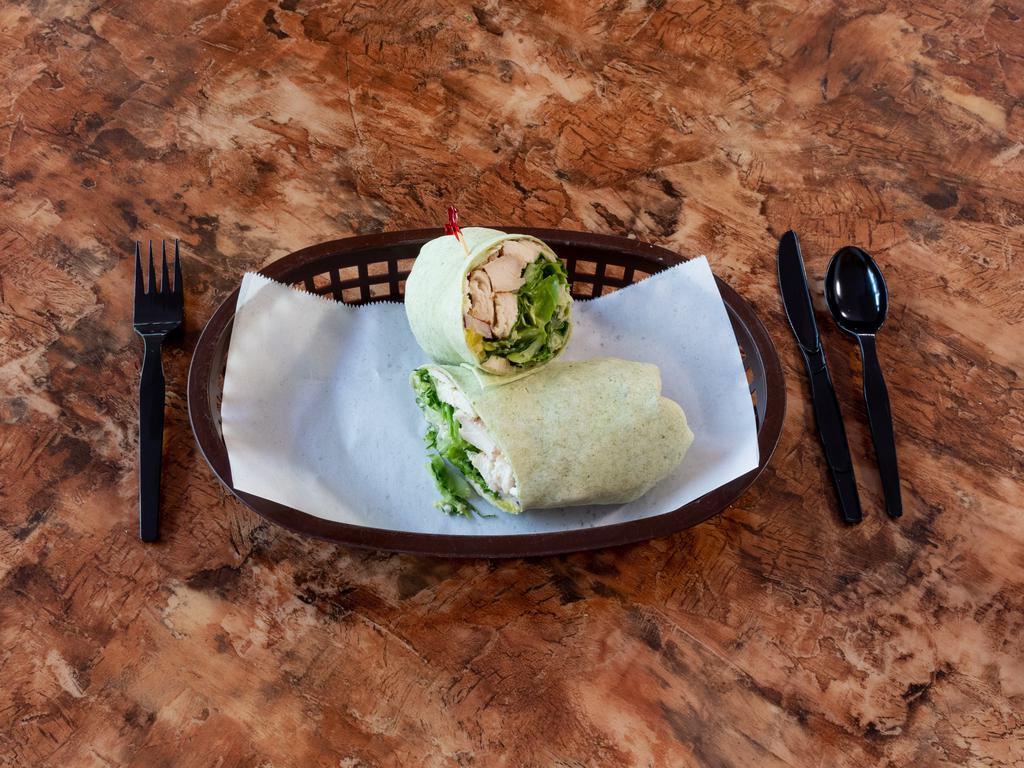 Athens Wrap · Grilled chicken, feta cheese, hummus, cucumber, lettuce, pepperoncini, onion, with Caesar dressing in a spinach tortilla.
