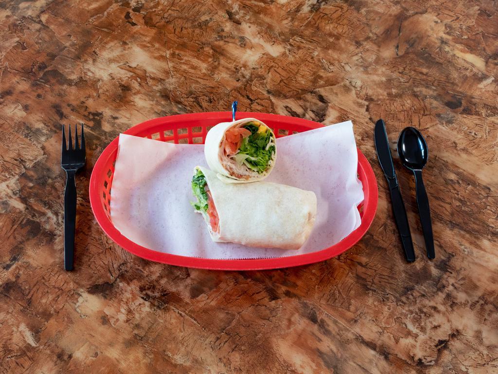 Classic Club Wrap Combo · Tuna salad, lettuce, tomato, sprouts with mayo on a wheat tortilla with a pickle spear. Includes side of potato salad, macaroni salad, coleslaw, pasta salad or chips and a 20 oz. drink.