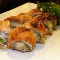 43. Baked Salmon Roll · Inside: Crab Meat*, Cucumber,Avocado
Outside: Salmon