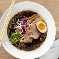 Ma Yu Paitan Ramen · Creamy broth ramen made from a mixture of chicken and pork with black garlic oil. topped wit...