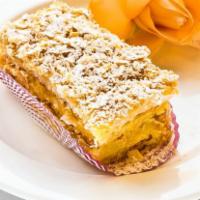 Napoleon Slice · Layers of flaky French pastry and vanilla custard dusted with powder sugar