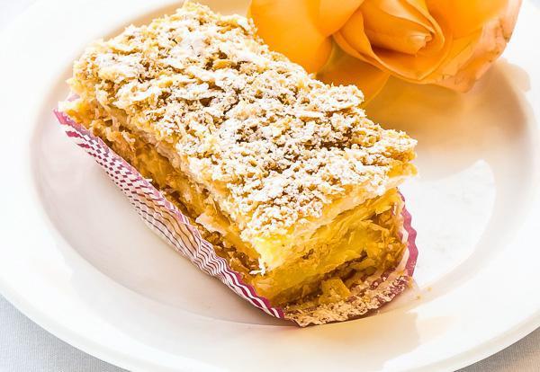 Napoleon Slice · Layers of flaky French pastry and vanilla custard dusted with powder sugar