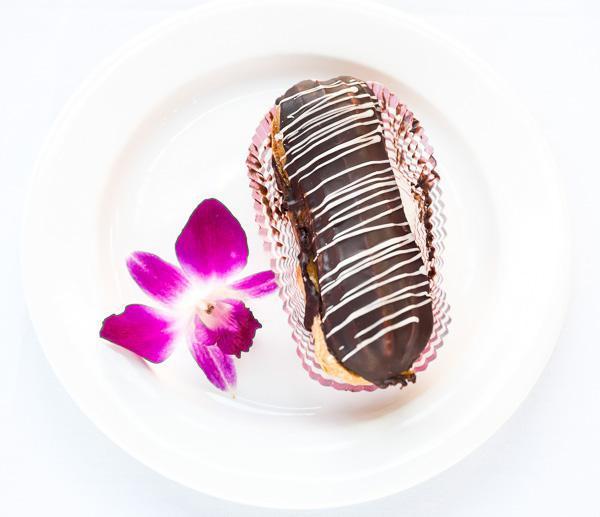 Eclair Pastry · Classic dessert filled with vanilla custard and topped with a layer of chocolate ganache