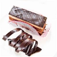 Chocolate Mousse · Layers of chocolate cake and chocolate mousse topped with chocolate ganache.