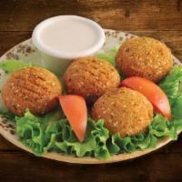 Falafel · 4 pieces. Vegetarian handcrafted chickpea patties with onions, garlic, herbs and spices and ...