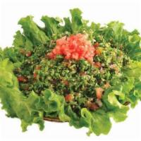 Tabouleh · Cracked bulgur wheat with freshly diced parsley, tomatoes, onions, tossed with lemon juice a...
