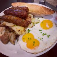 Eggs Your Way · 2 eggs cooked your way, choice of bacon, ham, or sausage. Served with Altea's Lyonnaise pota...
