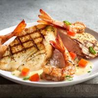 Accidental Fish ＆ Shrimp · Pan Seared Wild Caught Flounder over a bed of Jasmine Rice, topped with Grilled Shrimp, and ...