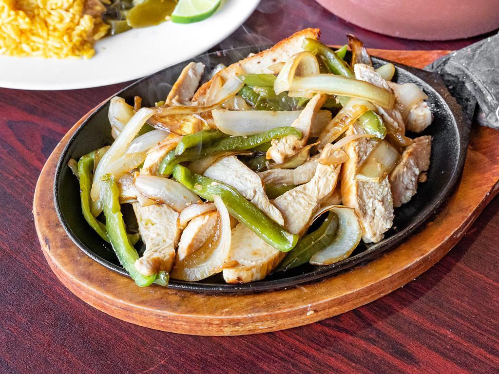 Sizzling Chicken Fajitas · Grilled chicken with green peppers and onions on a sizzle plate served with seasoned rice, lettuce, tomatoes, jalapenos, salsa, and sour cream.  Serve with a side of warm tortilla wraps