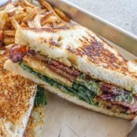 BLT Sandwich · Applewood smoked bacon, arugula, fried green tomatoes, avocado chimichurri and toasted sourd...