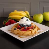 Berry Waffle · Topped with strawberry and blueberry.