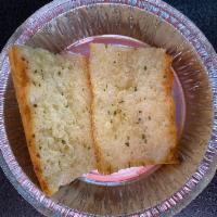 Garlic Bread · Two 8-inch pieces of garlic bread with our home-made garlic butter.