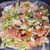 Large Chopped Chicken Salad · Shredded lettuce, bacon, bleu cheese, green onions, chicken, pasta and tomates tossed in our...