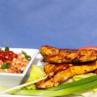 2 Chicken Satay · Prepared with nuts.
