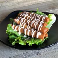 Shrimp Rolls (5) · Crunchy shrimp egg rolls served with house special sauce