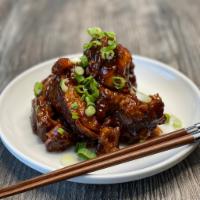 Asian Riblet · Riblets marinated in Asian spices and glazed in homemade BBQ sauce.