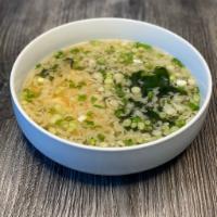 Miso Soup · Tofu, seaweed, dashi and scallions.