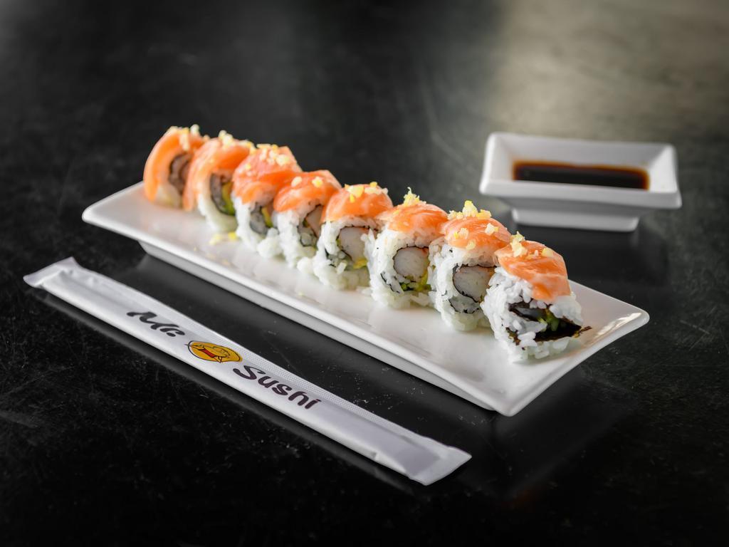Lemon Drop Roll · Crabstick, cucumber, avocado, topped with salmon and thinly sliced lemon.