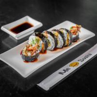 Jumping Spider Roll · Fried soft shell crab, cucumber, cream cheese stuffed jalapeno topped with masago sweet sauc...