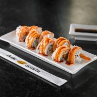 Texas Roll · Tempura shrimp, crab stick on top, avocado, and spicy mayo with sweet sauce. Spicy.