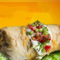 Philly Cheese Steak Chimichanga · Fried flour tortilla, with steak, bell peppers, onions and cheese.