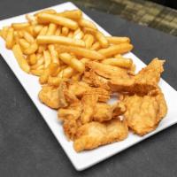 Chicharron de Pollo · Chunks of fried chicken served with french fries.