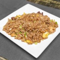 Chaufa Mixto · Mix fried rice (chicken and beef) with scrambled egg and green onions.