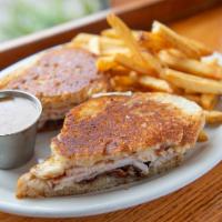 Smoked Turkey, Bacon & Swiss Sandwich · Smoked turkey, Swiss cheese, and crispy bacon on grilled sourdough bread. Served with honey ...