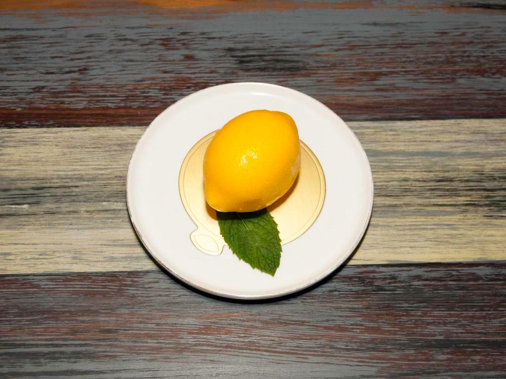 Lemon Mousse · Lemon Flavor Mousse with White Chocolate Shell and REAL Lemon Skin Filling 