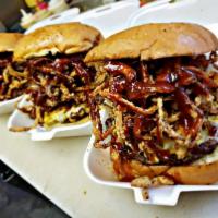 Bacon Cheddar BBQ Burger · Crisp bacon, tons of melted cheddar cheese (fresh sliced), crispy fried onion ring stacks, m...