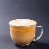 Cappuccino · A twelve oz espresso drink with milk and thick foam.