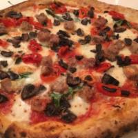 Maradona Pizza · Fresh mozzarella, Italian sausage, Peppadew peppers, mushrooms, Pecorino Romano and basil.