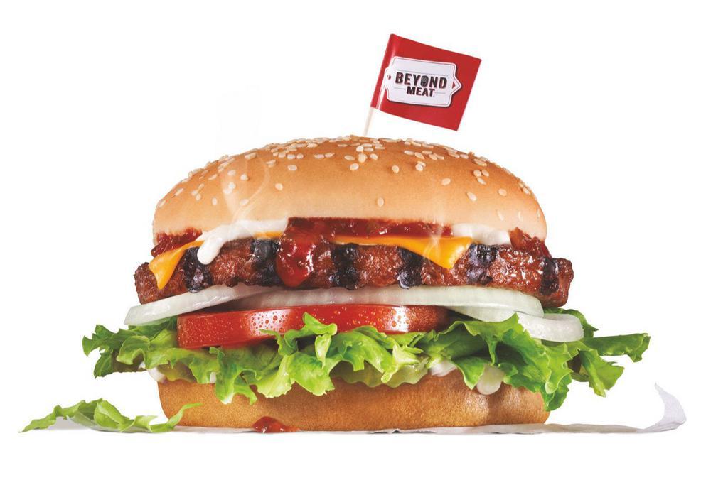 Beyond Famous Star Burger with Cheese · Charbroiled Beyond plant based patty, melted American cheese, lettuce, tomato, sliced onions, dill pickles, special sauce, and mayonnaise on a seeded bun.
