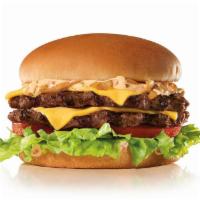 The California Classic Double Cheeseburger · Two charbroiled all-beef patties, American cheese, grilled onions, Classic Sauce, lettuce an...