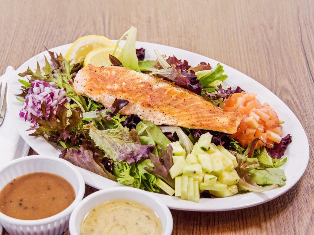 Salmon Salad  · 8 oz. Grilled Fresh Atlantic Salmon on a Bed of Baby Greens with Cucumber and Tomato. Italian Lemon Vinaigrette served on the side