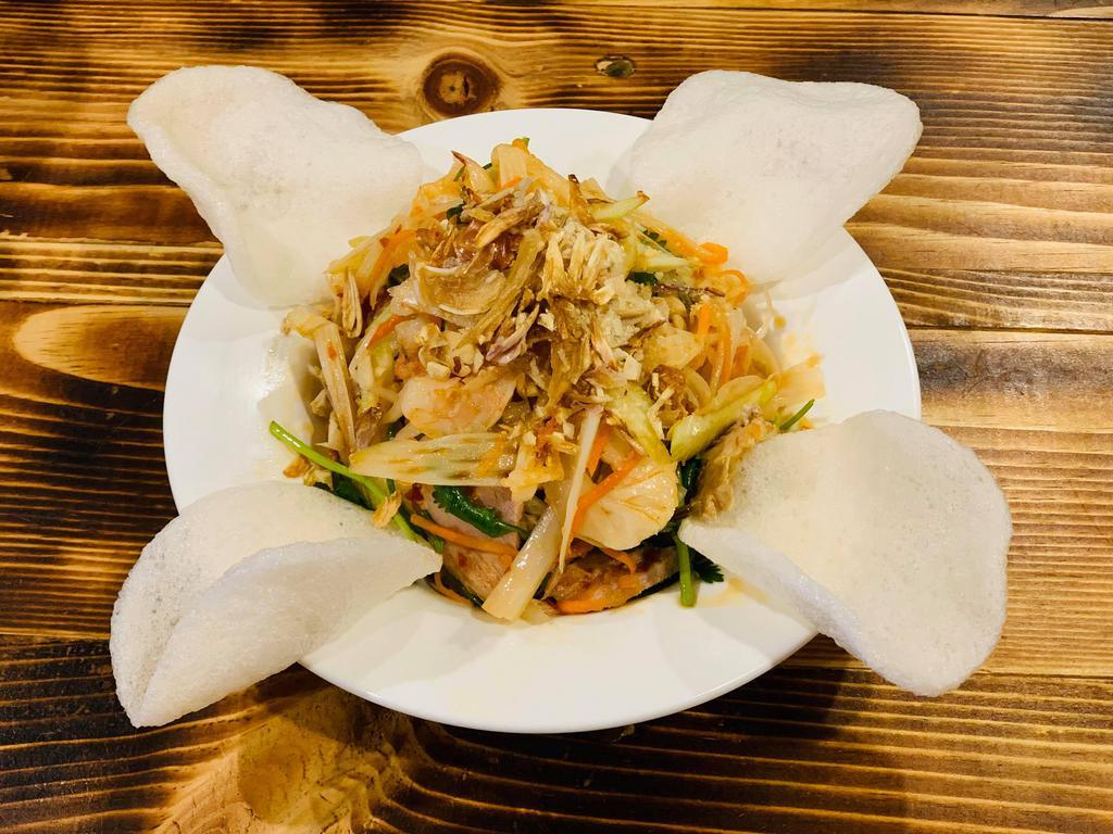 G4. Lotus Rhizome Salad · Lotus roots served with shrimp, pork, and house sauce.