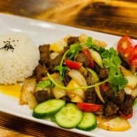 C3. Vietnamese Beef Cube with Rice · White rice dish served with Vietnamese style beef cube.