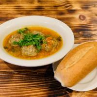 T2. Vietnamese Shiumai · Vietnamese style meatball in tomato sauce served with french roll.