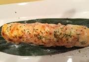 Lion King Roll · Spicy. Crab, avocado, and fish roe surrounded by salmon and spicy mayo then topped with chee...
