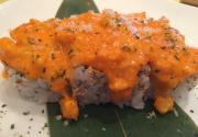 Golden Bridge Roll · Spicy. Crab, avocado, fish roe, cheese, topped with broiled scallop, cheese, and spicy mayo. 