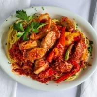 Sausage ＆ Peppers Plate · Slice sausage, onion, and bell peppers sauteed with Marinara sauce on a bed of spaghetti.