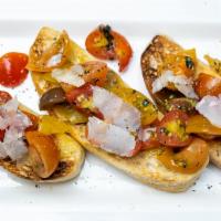 Brushetta · toasted focaccia, tomatoes,olive oil, vinegar, parmesan flakes