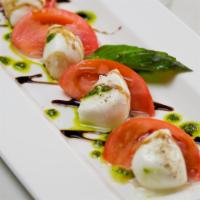 CAPRESE · Buffalo mozzarella, local tomato, extra virgin olive oil, fresh basil, sea salt, balsamic gl...